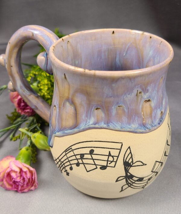 Purple mug with musical illustration